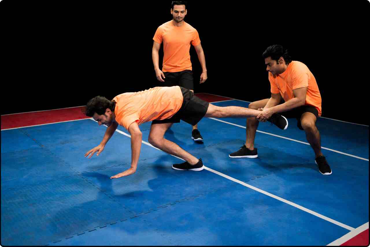 Kabaddi players demonstrating agility and strength in a match